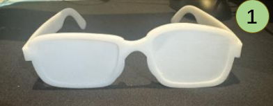 White 3D-printed eyewear prototype fabricated for the first participant.